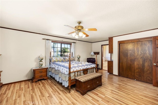 41050 Mesa Robles Cir, Temecula, CA 92592 - bedroom with light wood-type flooring, crown molding, a ceiling fan, and ensuite bath