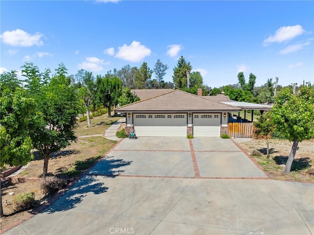 41050 Mesa Robles Cir, Temecula, CA 92592 - single story home featuring concrete driveway, a garage, a tiled roof, and a chimney