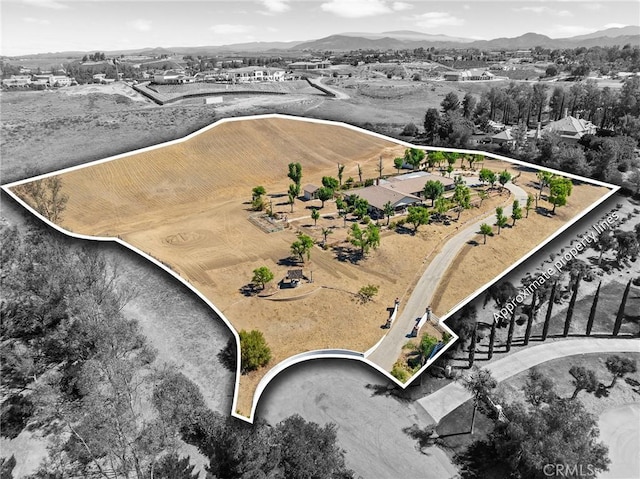 41050 Mesa Robles Cir, Temecula, CA 92592 - aerial overview of property's location featuring mountains and property parcel outlined