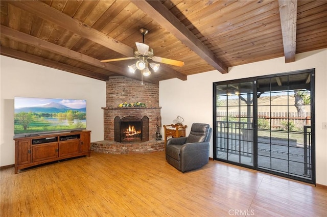41050 Mesa Robles Cir, Temecula, CA 92592 - living area with light wood-style flooring, wood ceiling, a ceiling fan, and a fireplace