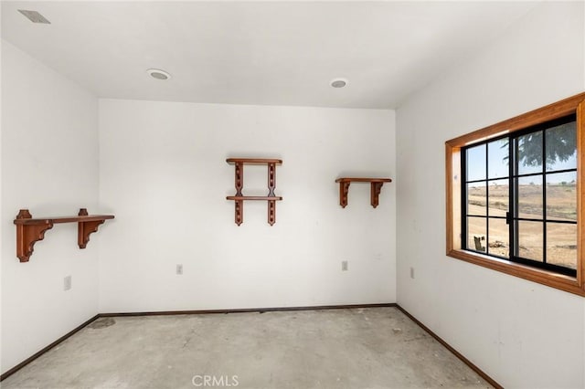 41050 Mesa Robles Cir, Temecula, CA 92592 - empty room featuring unfinished concrete floors and baseboards