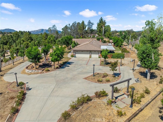 41050 Mesa Robles Cir, Temecula, CA 92592 - aerial view of property and surrounding area with a mountainous background