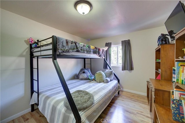 4887 Arizona Ave, Atascadero, CA 93422 - bedroom with light wood-style floors and baseboards