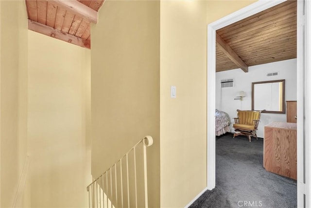506 Geneva Ave, Claremont, CA 91711 - corridor with a wood ceiling with exposed beams, dark colored carpet, and an upstairs landing