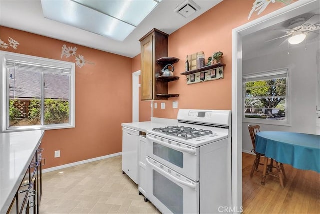 506 Geneva Ave, Claremont, CA 91711 - kitchen with white appliances, ceiling fan, and light countertops