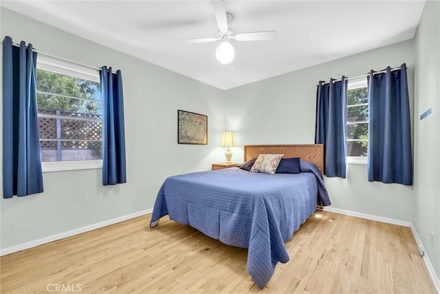 506 Geneva Ave, Claremont, CA 91711 - bedroom featuring wood finished floors, multiple windows, and a ceiling fan