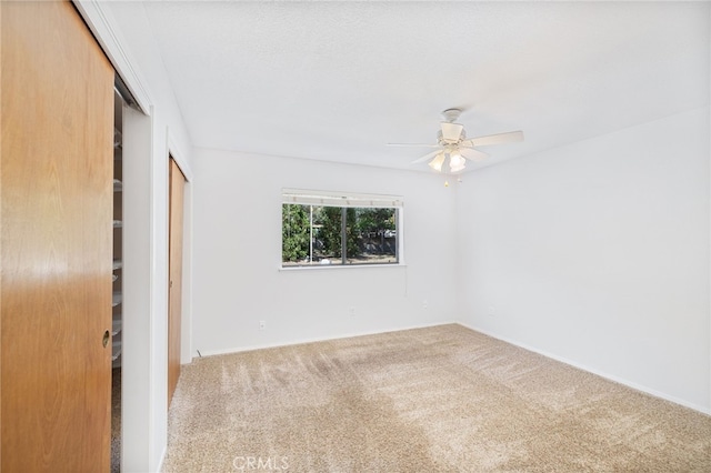 50128 Deer Meadow Way, Oakhurst, CA 93644 - unfurnished bedroom with carpet, a closet, and a ceiling fan