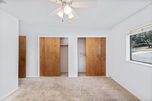 50128 Deer Meadow Way, Oakhurst, CA 93644 - unfurnished bedroom featuring multiple closets, carpet flooring, and a ceiling fan
