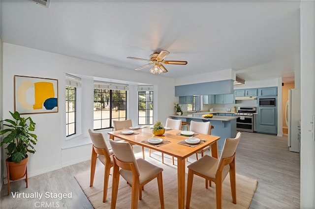 50128 Deer Meadow Way, Oakhurst, CA 93644 - dining area featuring a ceiling fan and light wood finished floors