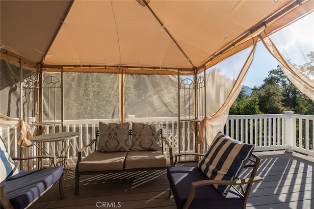 50128 Deer Meadow Way, Oakhurst, CA 93644 - wooden deck with a gazebo and outdoor lounge area