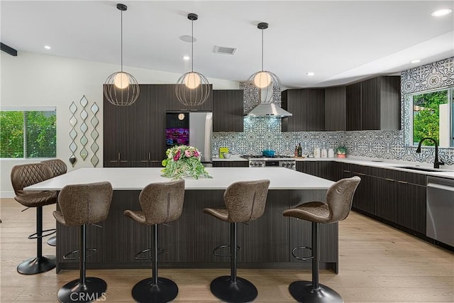 1525 Sonora Ct, Palm Springs, CA 92264 - kitchen featuring fridge, modern cabinets, stainless steel dishwasher, light countertops, and recessed lighting