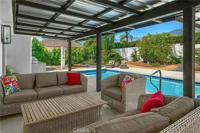 1525 Sonora Ct, Palm Springs, CA 92264 - view of swimming pool featuring outdoor lounge area, a fenced backyard, a pergola, and a mountain view