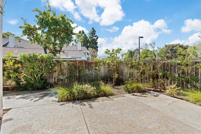 2 Brookstone, Irvine, CA 92604 - fenced backyard with a patio