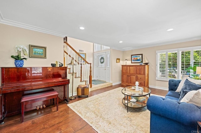 2702 Jacaranda Ave, Carlsbad, CA 92009 - living area with ornamental molding, wood finished floors, stairs, and recessed lighting