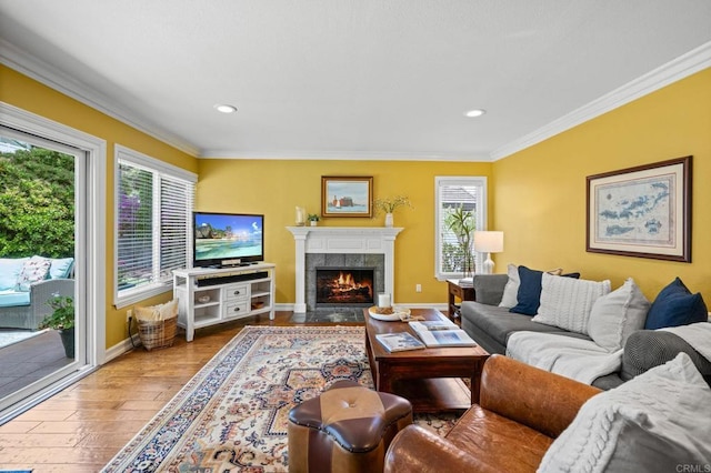 2702 Jacaranda Ave, Carlsbad, CA 92009 - living area featuring a fireplace, crown molding, wood finished floors, and recessed lighting