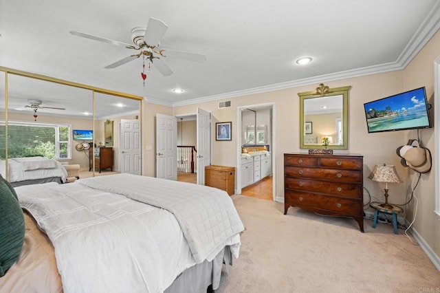 2702 Jacaranda Ave, Carlsbad, CA 92009 - bedroom with ornamental molding, light colored carpet, recessed lighting, connected bathroom, and ceiling fan