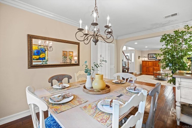 2702 Jacaranda Ave, Carlsbad, CA 92009 - dining space featuring a chandelier, arched walkways, ornamental molding, hardwood / wood-style floors, and recessed lighting
