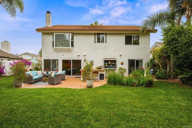 2702 Jacaranda Ave, Carlsbad, CA 92009 - back of house featuring an outdoor living space, a patio area, a chimney, and a yard