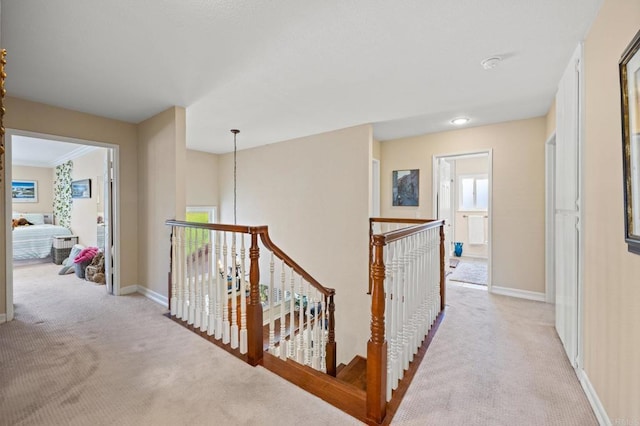 2702 Jacaranda Ave, Carlsbad, CA 92009 - corridor featuring light carpet and an upstairs landing