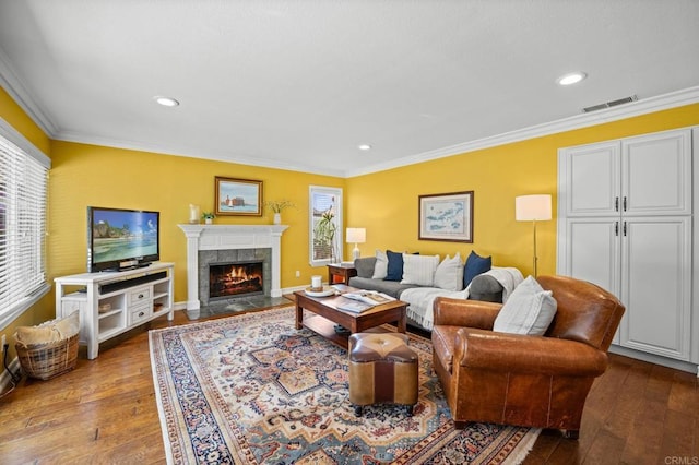 2702 Jacaranda Ave, Carlsbad, CA 92009 - living room featuring a fireplace, crown molding, dark wood-style flooring, and recessed lighting