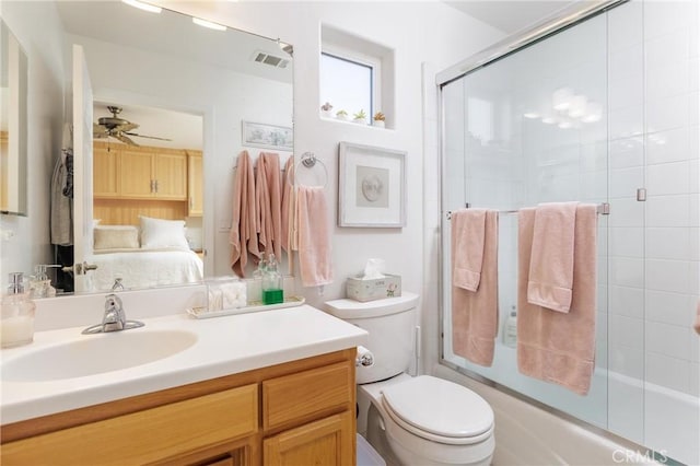 1939 Circle Dr, Cayucos, CA 93430 - full bathroom featuring ensuite bath, vanity, bath / shower combo with glass door, and a ceiling fan