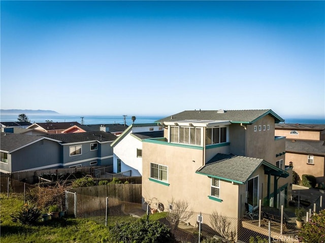 1939 Circle Dr, Cayucos, CA 93430 - rear view of property featuring a water view and stucco siding