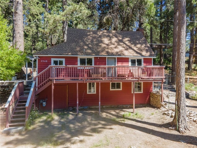 2548 Secret Dr, Running Springs, CA 92382 - back of house featuring stairs, a deck, and a shingled roof