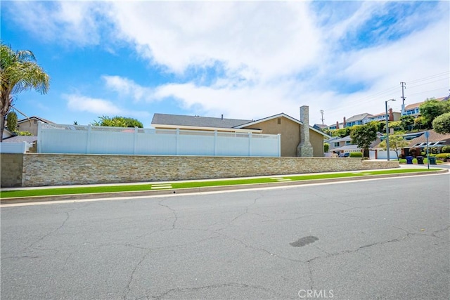 20002 Tomlee Ave, Torrance, CA 90503 - view of asphalt street featuring sidewalks, curbs, and a residential view