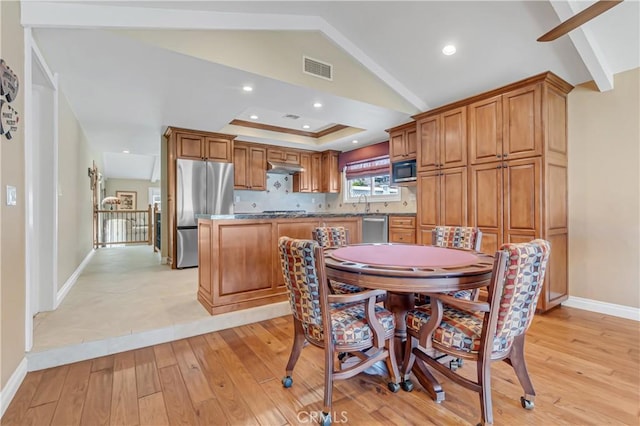 20002 Tomlee Ave, Torrance, CA 90503 - dining space with light wood-type flooring, vaulted ceiling, and recessed lighting