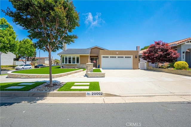 20002 Tomlee Ave, Torrance, CA 90503 - view of front of property featuring a garage, stucco siding, a front lawn, and concrete driveway