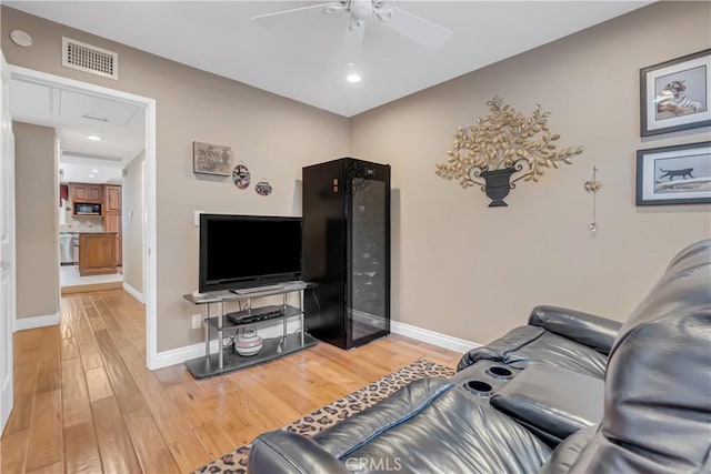 20002 Tomlee Ave, Torrance, CA 90503 - living room featuring a ceiling fan, light wood finished floors, and recessed lighting