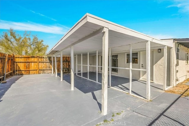 73461 El Paseo Dr Unit 29, Palms, CA 92277 - view of patio / terrace featuring a carport