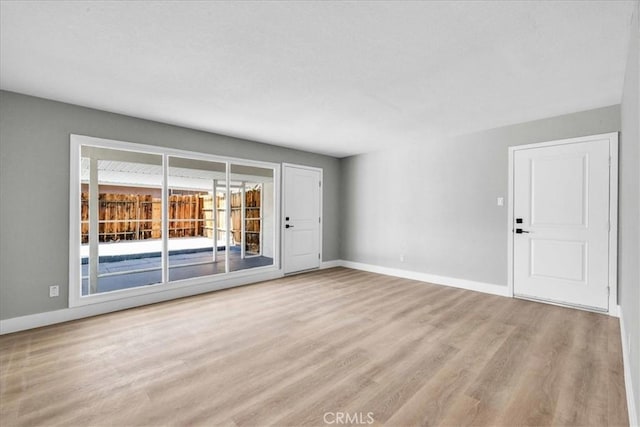 73461 El Paseo Dr Unit 29, Palms, CA 92277 - unfurnished room with wood finished floors and baseboards