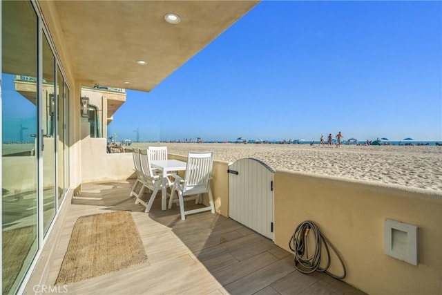 3312 W Oceanfront, Newport Beach, CA 92663 - wooden terrace featuring outdoor dining space