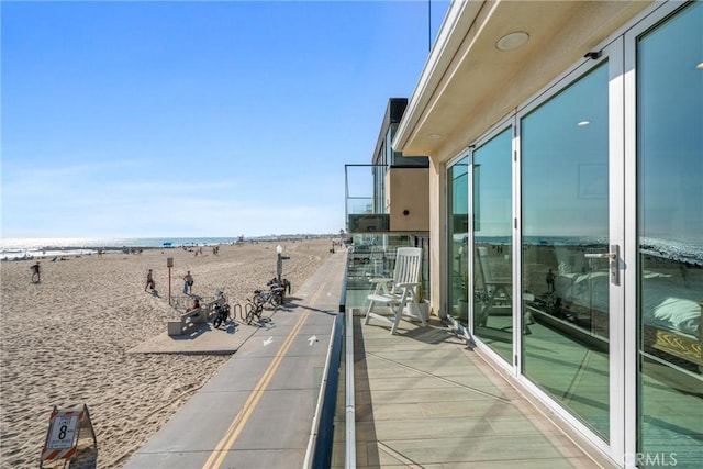 3312 W Oceanfront, Newport Beach, CA 92663 - balcony featuring view of water and beach