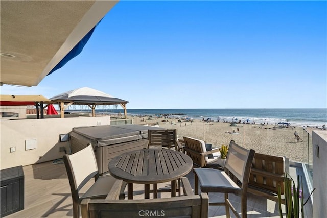 3312 W Oceanfront, Newport Beach, CA 92663 - view of patio / terrace with view of water and beach and a gazebo