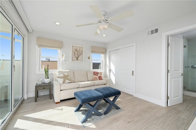 3312 W Oceanfront, Newport Beach, CA 92663 - living area with plenty of natural light, light wood-type flooring, recessed lighting, and ceiling fan