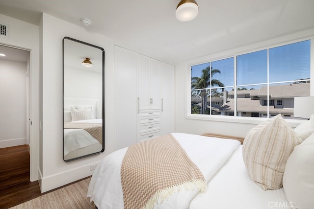 1933 Port Bristol Cir, Newport Beach, CA 92660 - bedroom featuring wood finished floors and baseboards