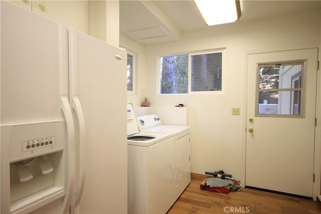 211 Heliotrope Dr, Lake Arrowhead, CA 92352 - laundry area with light wood-type flooring and washing machine and dryer