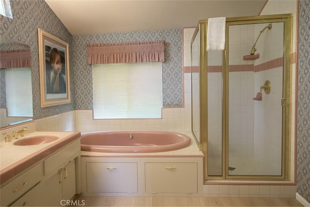 211 Heliotrope Dr, Lake Arrowhead, CA 92352 - full bath featuring a garden tub, a shower stall, wallpapered walls, and vanity