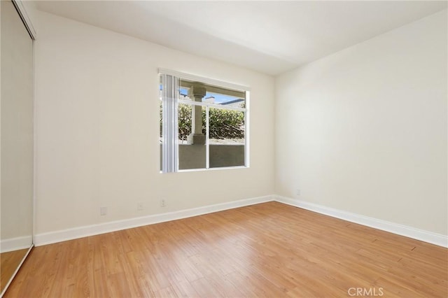 30902 Clubhouse Dr Unit 17A, Laguna Niguel, CA 92677 - spare room featuring light wood finished floors and baseboards