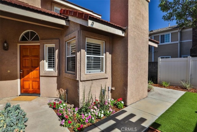 8366 Gabriel Dr Unit D, Rancho Cucamonga, CA 91730 - doorway to property with stucco siding