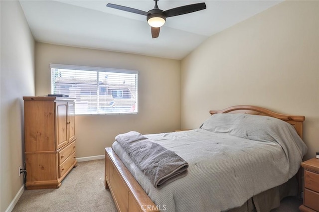 8366 Gabriel Dr Unit D, Rancho Cucamonga, CA 91730 - bedroom featuring light carpet, a ceiling fan, and vaulted ceiling