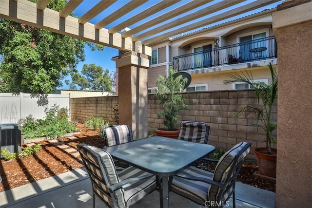 8366 Gabriel Dr Unit D, Rancho Cucamonga, CA 91730 - fenced backyard featuring outdoor dining space, a pergola, and a patio