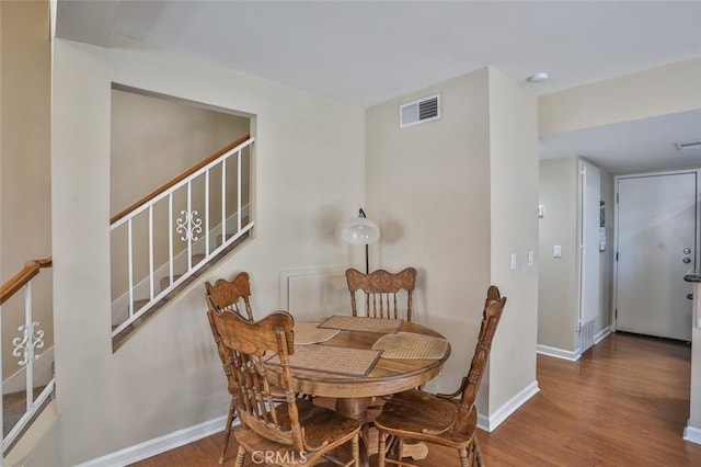 8366 Gabriel Dr Unit D, Rancho Cucamonga, CA 91730 - dining area featuring wood finished floors and stairway