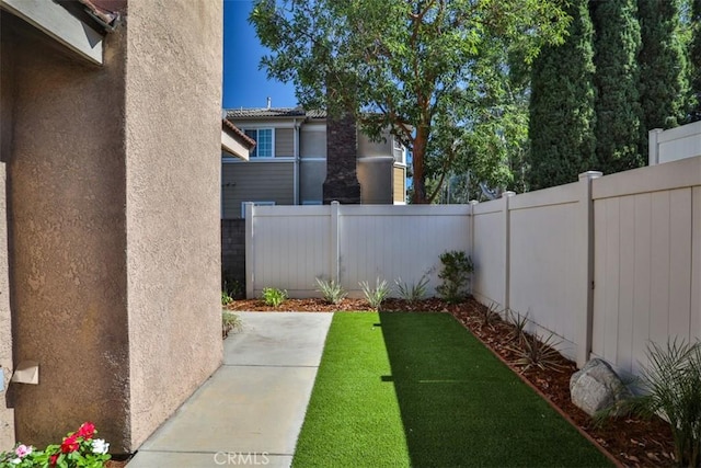 8366 Gabriel Dr Unit D, Rancho Cucamonga, CA 91730 - fenced backyard featuring a patio area