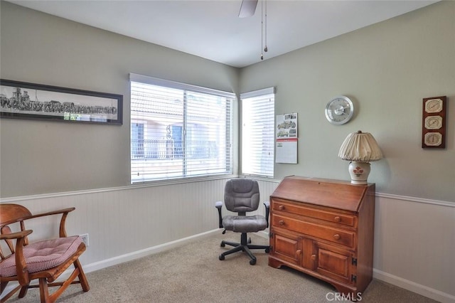 8366 Gabriel Dr Unit D, Rancho Cucamonga, CA 91730 - carpeted office featuring healthy amount of natural light, a wainscoted wall, and a ceiling fan