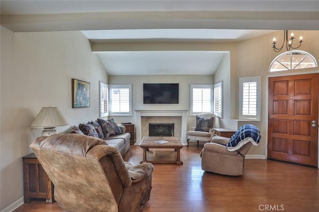 8366 Gabriel Dr Unit D, Rancho Cucamonga, CA 91730 - living room featuring a chandelier, wood finished floors, and a high end fireplace