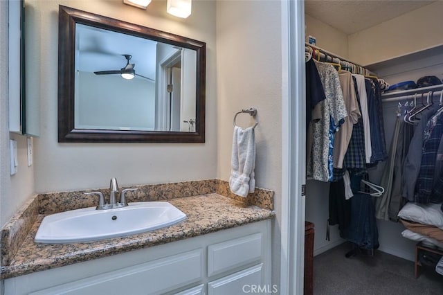 8366 Gabriel Dr Unit D, Rancho Cucamonga, CA 91730 - bathroom featuring vanity and a spacious closet