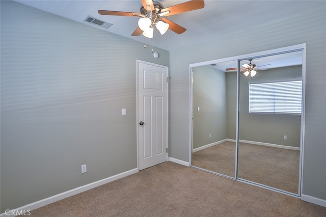 8366 Gabriel Dr Unit D, Rancho Cucamonga, CA 91730 - unfurnished bedroom featuring carpet, a closet, and a ceiling fan
